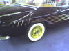 gold rims on cadillac at the las vegas car show